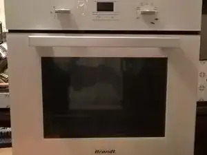 Remplacement du ventilateur de chaleur tournante d'un four Brandt FP1061W1