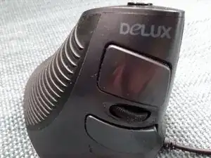 Comment réparer le glissement de la molette de défilement sur la souris DELUX M618