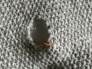 Comment réparer un trou dans une couverture en tricot