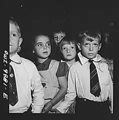 First graders in public school singing the Star Spangled Banner