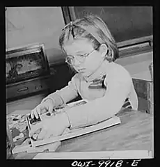 Kindergarten pupil getting to work on a puzzle